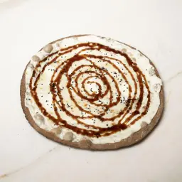 Red Bread Ush Al Bulbul Pizza